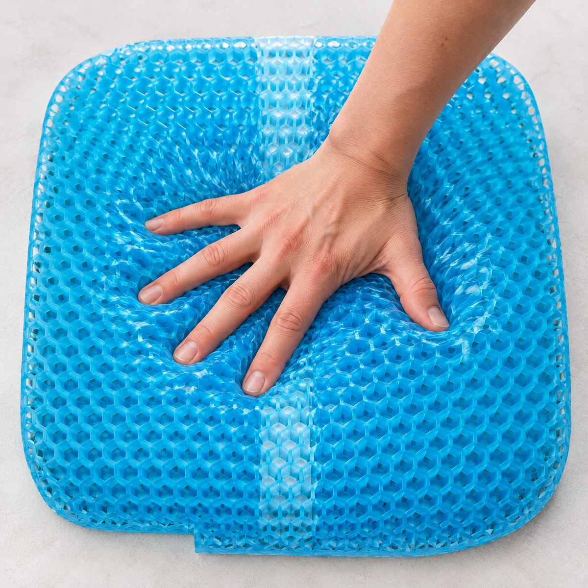 Hand pressing into the Milewell gel cushion